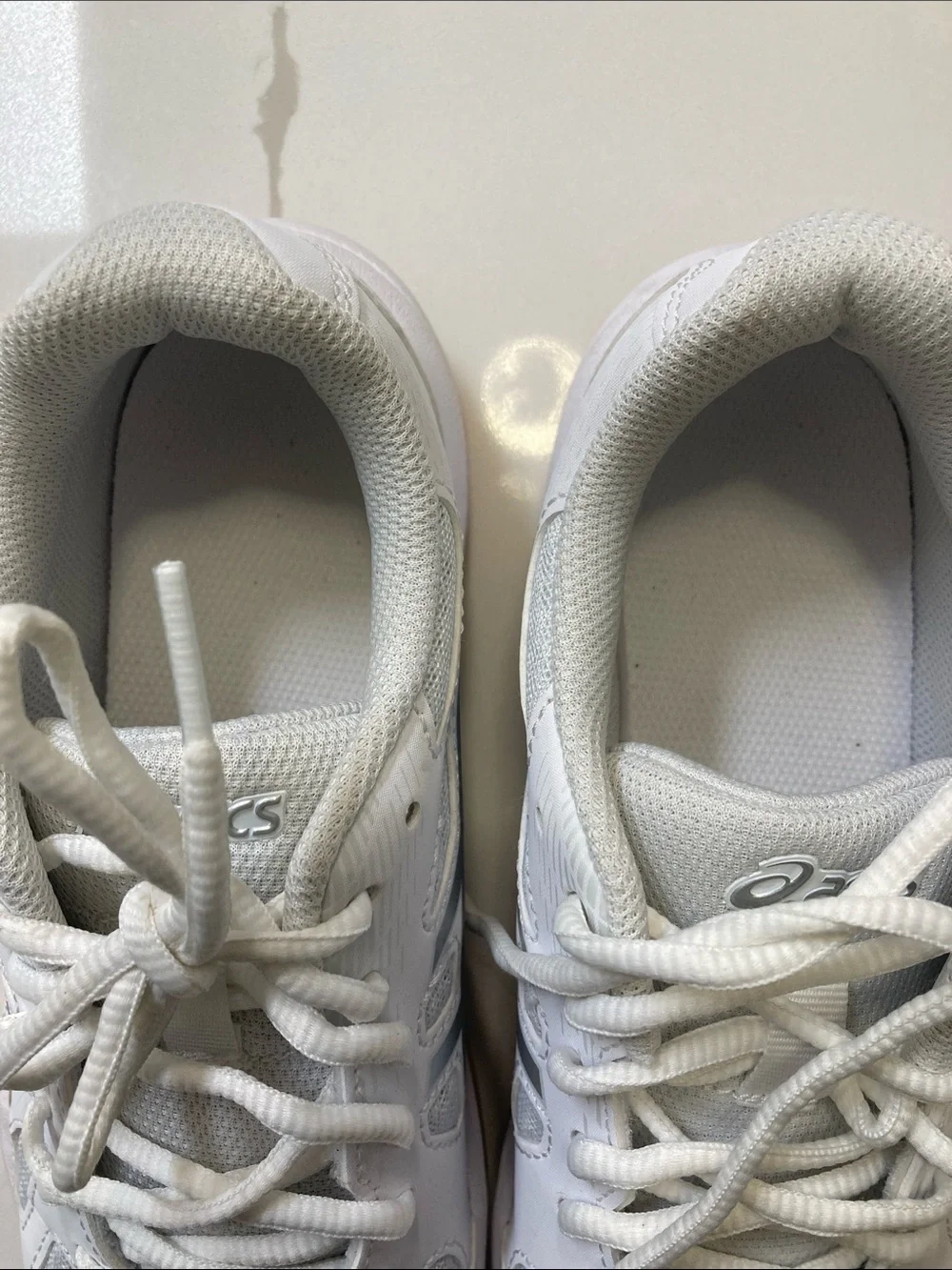 ASICS White Sneakers with Orange Sole Trim